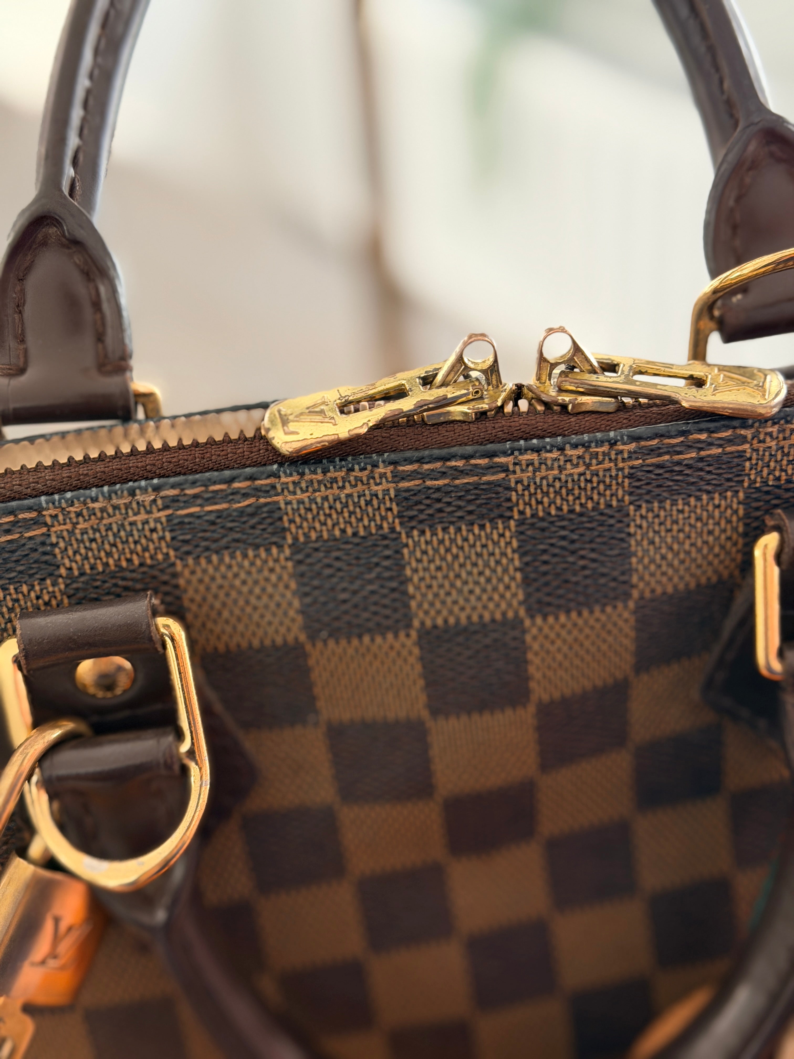 Louis Vuitton Alma Ebene PM Made in France Gold Hardware