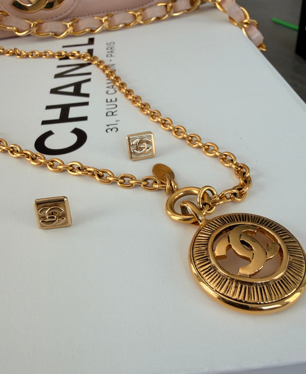 Chanel Turnlock CC Stud Earrings 24k Gold Plated