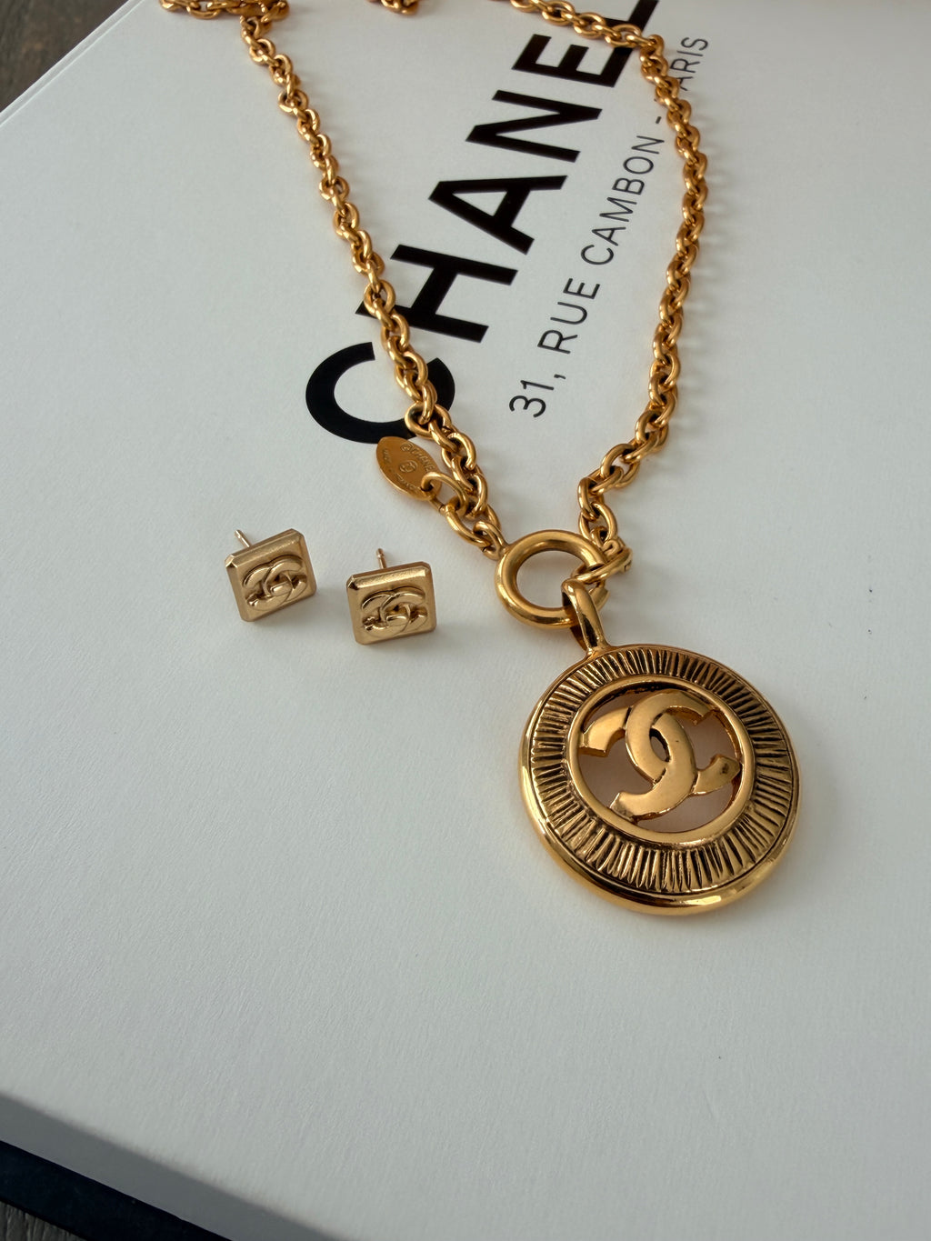 Chanel Turnlock CC Stud Earrings 24k Gold Plated