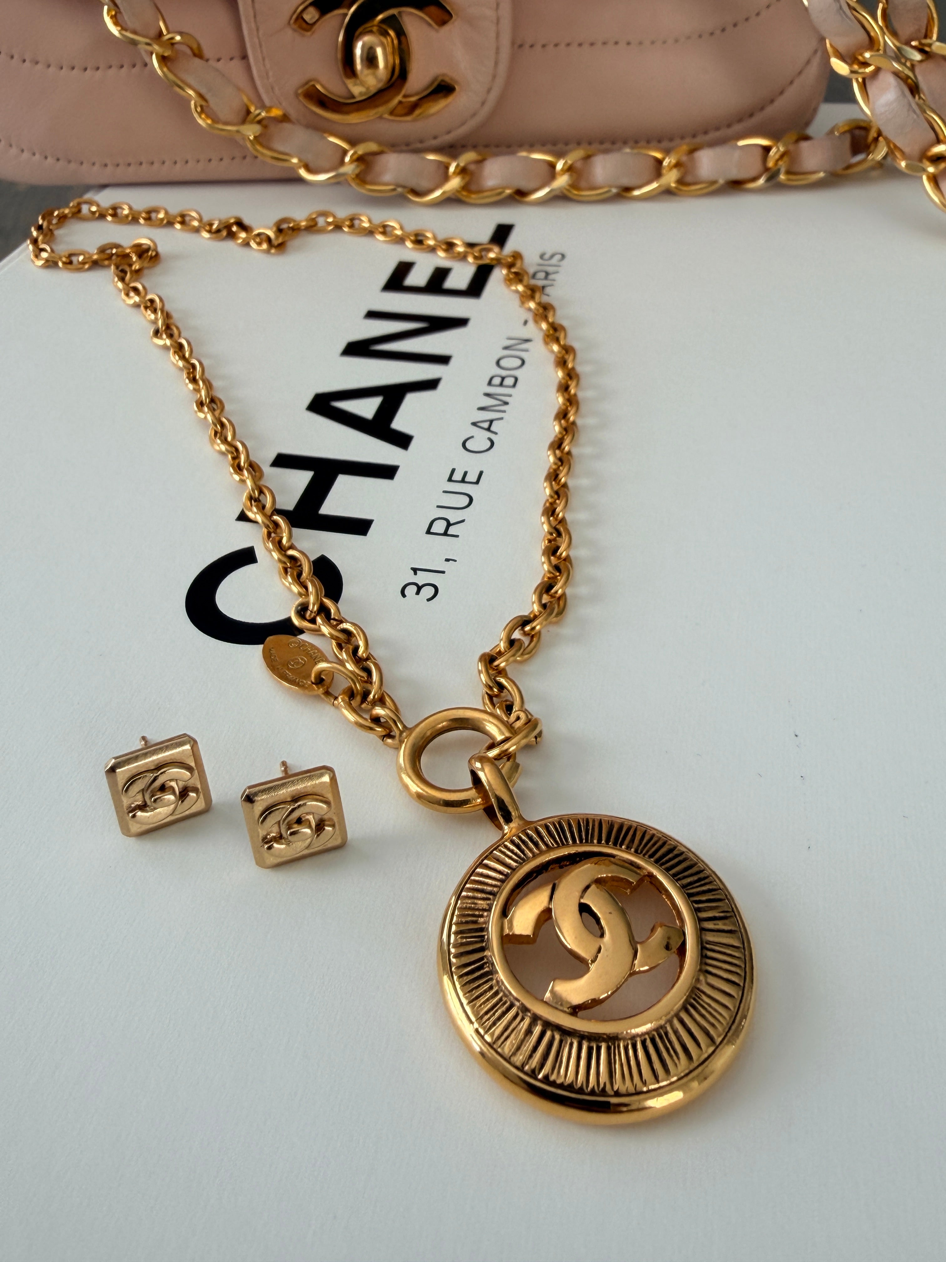 Chanel Turnlock CC Stud Earrings 24k Gold Plated