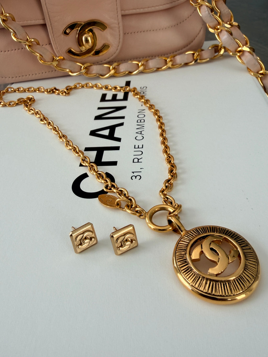 Chanel Turnlock CC Stud Earrings 24k Gold Plated