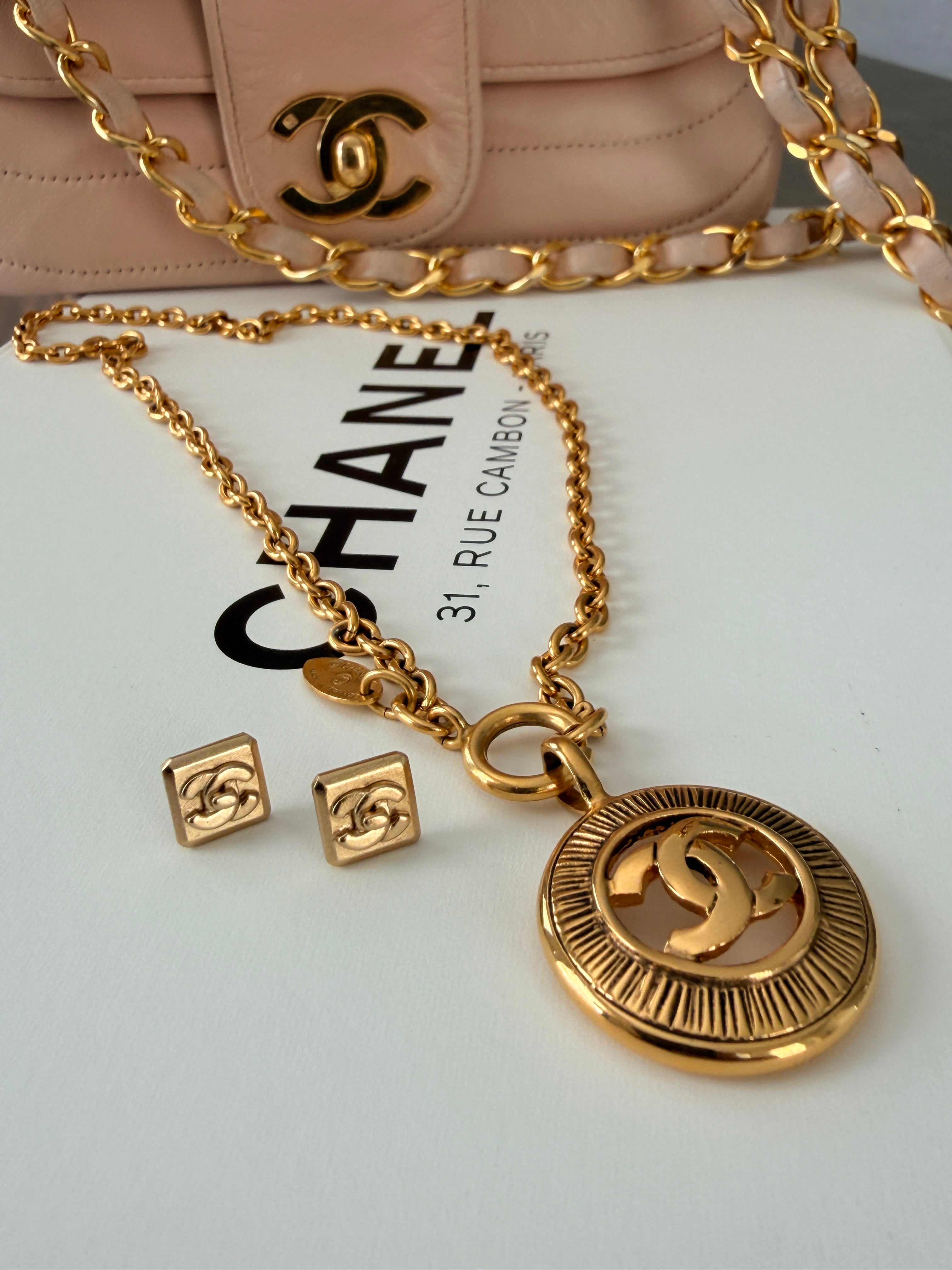 Chanel Turnlock CC Stud Earrings 24k Gold Plated