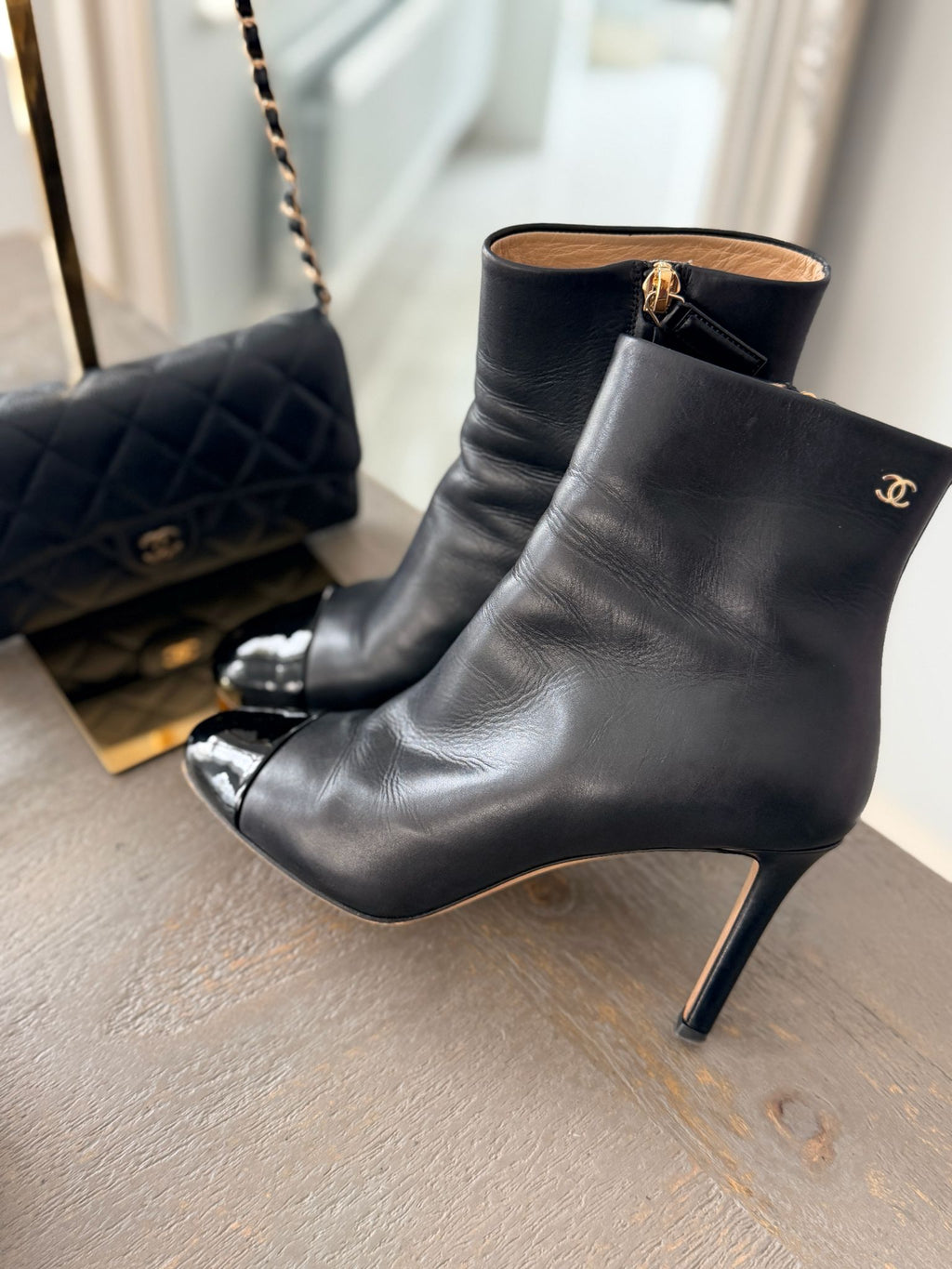 Chanel Black Calfskin & Patent Cap-Toe Ankle Boots Gold CC Logo