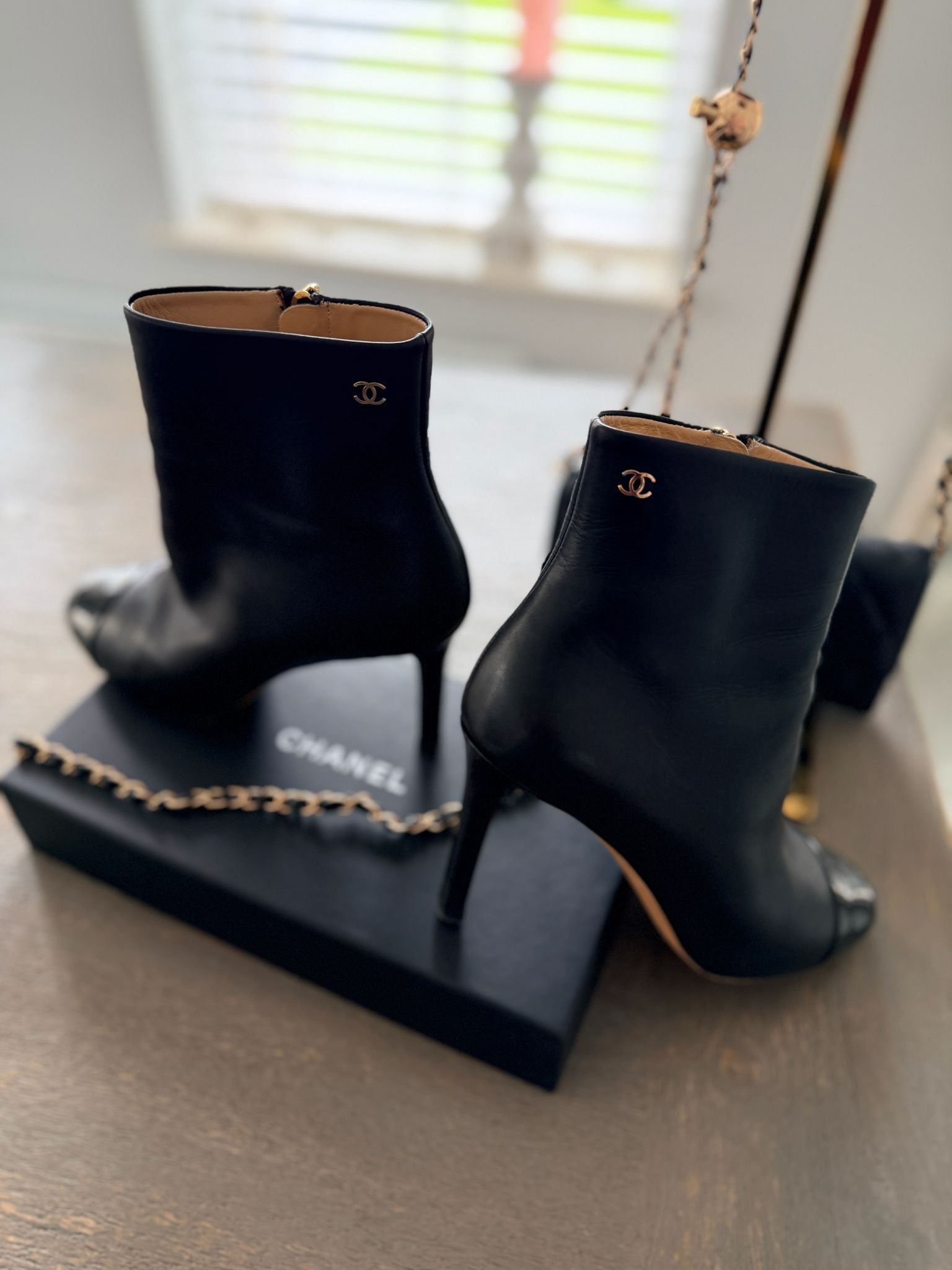 Chanel Black Calfskin & Patent Cap-Toe Ankle Boots Gold CC Logo